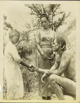Tarzan Meets a Small Frie...