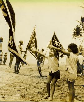 TWO children reaching out...