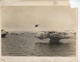 A Halicopter Files Over I...