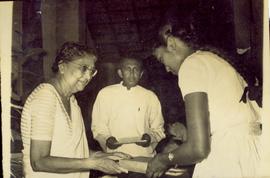 Mrs. Arthur Dias Giving a...