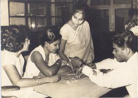 Examining Items of Silver...