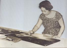 Madame Suematsu Using  a ...