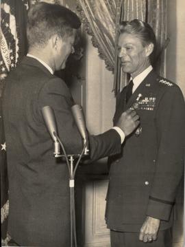 President Kennedy Pins Th...