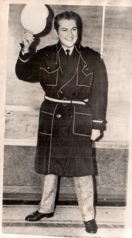 Liberace’s Raincoat Fashion