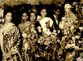 A Bevy of Women Admiring ...