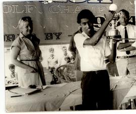M. Rohan Hoiding Aloft th...
