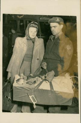 A Canadian Soldier Carrie...